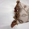 Terracotta / Natural Embroidered Cushion.